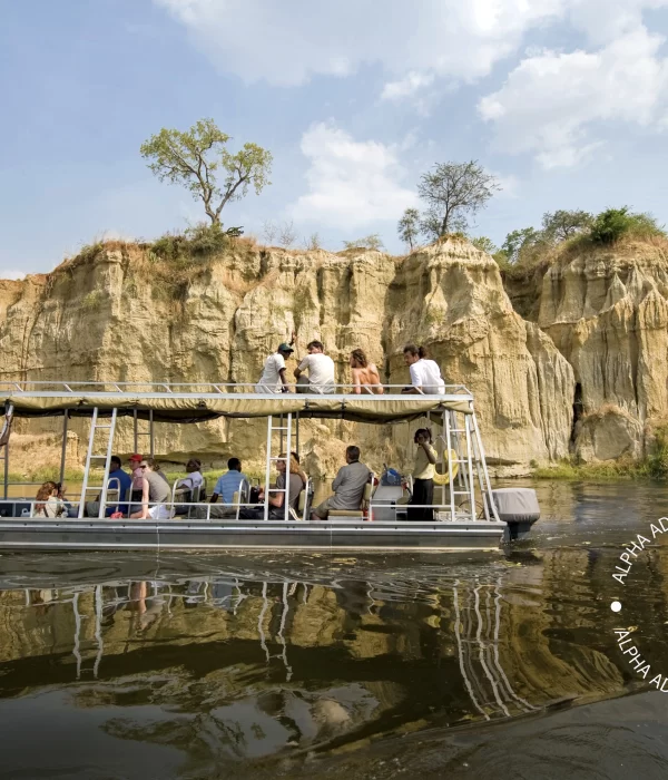 Visitors enjoying a boat ride at Murchison Falls in Murchison Falls National Park (MFNP)