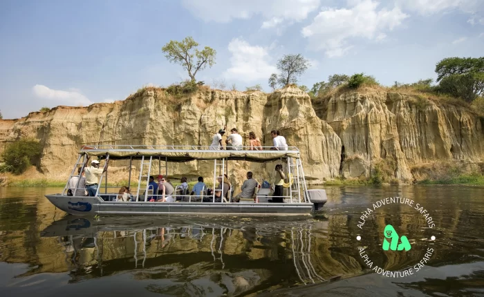 Visitors enjoying a boat ride at Murchison Falls in Murchison Falls National Park (MFNP)
